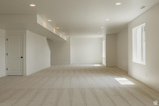 1026 W Chokecherry Dr Unit 135, Mapleton, UT 84664 - unfurnished living room featuring light carpet and recessed lighting