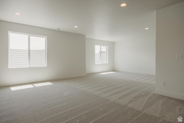 1026 W Chokecherry Dr Unit 135, Mapleton, UT 84664 - unfurnished room with light carpet and recessed lighting