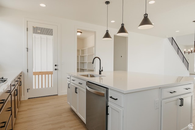 1026 W Chokecherry Dr Unit 135, Mapleton, UT 84664 - kitchen featuring stainless steel dishwasher, light wood finished floors, white cabinets, an island with sink, and recessed lighting