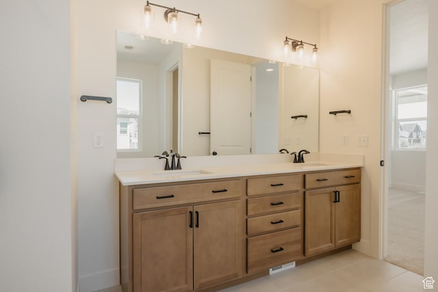 1026 W Chokecherry Dr Unit 135, Mapleton, UT 84664 - bathroom with double vanity and tile patterned floors