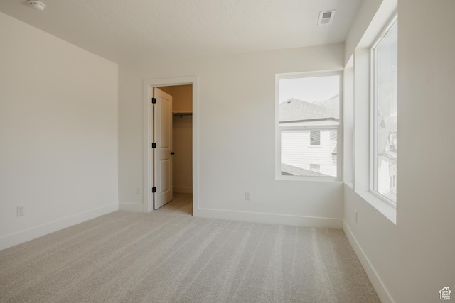 1026 W Chokecherry Dr Unit 135, Mapleton, UT 84664 - spare room with light colored carpet