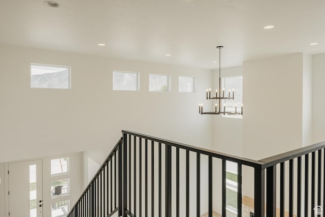 1026 W Chokecherry Dr Unit 135, Mapleton, UT 84664 - stairs featuring a chandelier and recessed lighting