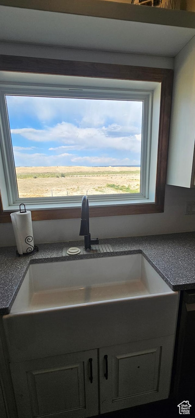1275 S Lawrence Rd, Huntington, UT 84528 - kitchen view of dark countertops