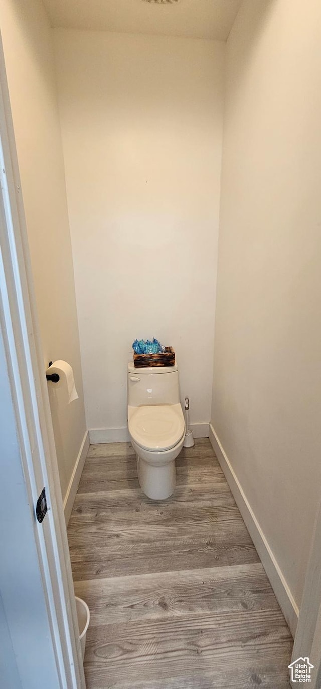1275 S Lawrence Rd, Huntington, UT 84528 - bathroom with toilet and wood finished floors