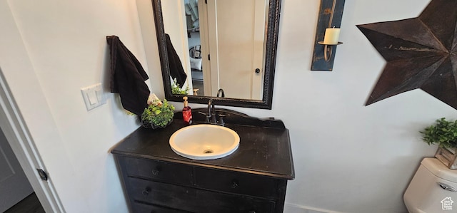 1275 S Lawrence Rd, Huntington, UT 84528 - bathroom featuring vanity and toilet