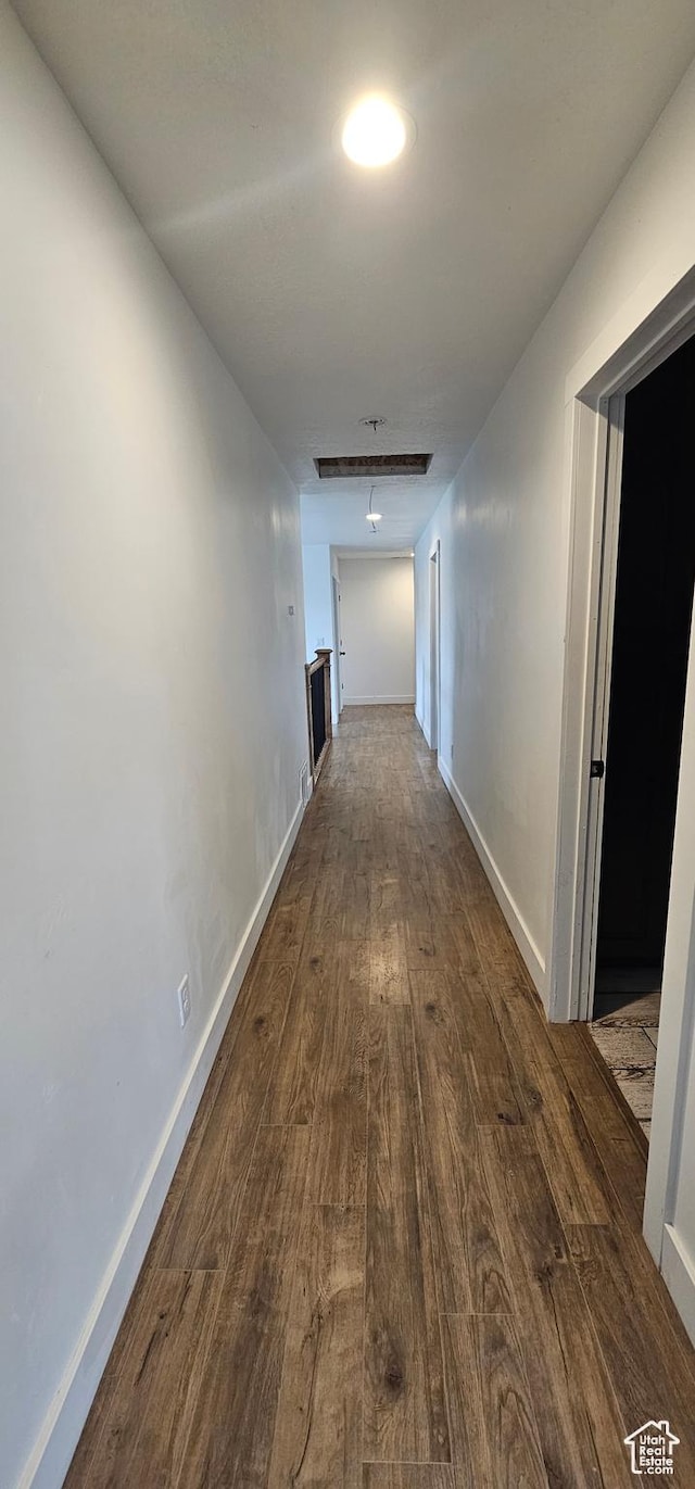 1275 S Lawrence Rd, Huntington, UT 84528 - hall featuring dark wood-type flooring and baseboards