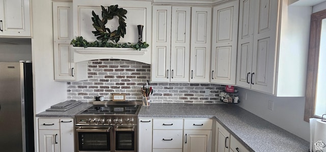 1275 S Lawrence Rd, Huntington, UT 84528 - kitchen with stainless steel appliances, white cabinetry, and dark countertops