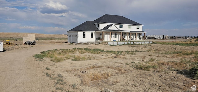 1275 S Lawrence Rd, Huntington, UT 84528 - view of front of house with a porch and a garage