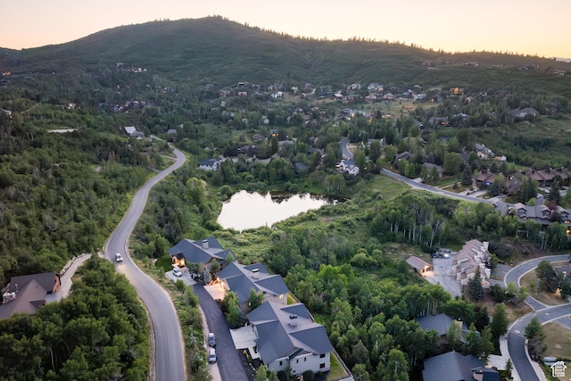4014 W Hidden Cv Unit 11, Park City, UT 84098 - aerial view at dusk of a residential view and a mountain view