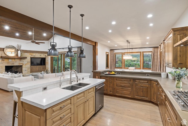 4014 W Hidden Cv Unit 11, Park City, UT 84098 - kitchen with stainless steel appliances, a kitchen island with sink, recessed lighting, light wood-type flooring, and lofted ceiling