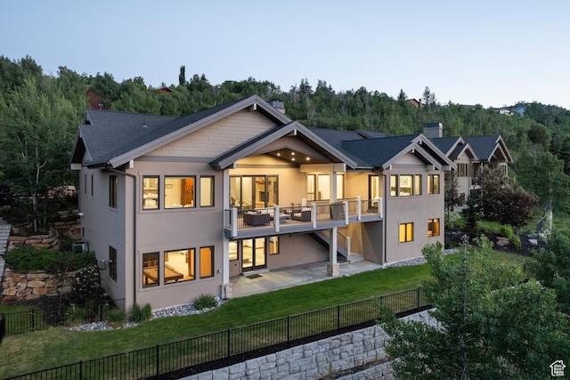 4014 W Hidden Cv Unit 11, Park City, UT 84098 - back of property with a fenced backyard, stucco siding, a patio area, and a chimney