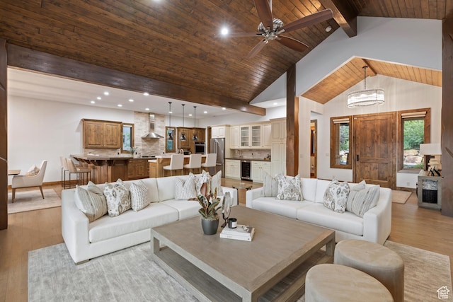4014 W Hidden Cv Unit 11, Park City, UT 84098 - living area featuring beverage cooler, light wood-style flooring, ceiling fan, recessed lighting, and high vaulted ceiling
