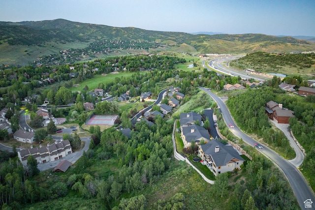 4014 W Hidden Cv Unit 11, Park City, UT 84098 - aerial view of property and surrounding area with nearby suburban area and a mountainous background