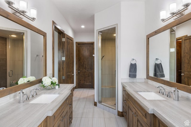 4014 W Hidden Cv Unit 11, Park City, UT 84098 - bathroom with two vanities, tile patterned floors, a stall shower, and recessed lighting