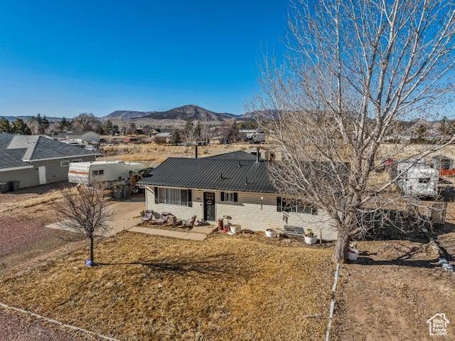 246 S 475 E, Enterprise, UT 84725 - ranch-style house featuring a mountain view and a metal roof