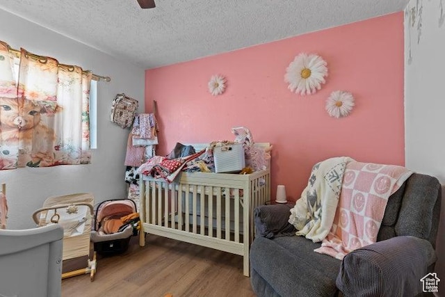 246 S 475 E, Enterprise, UT 84725 - bedroom with wood finished floors and a textured ceiling