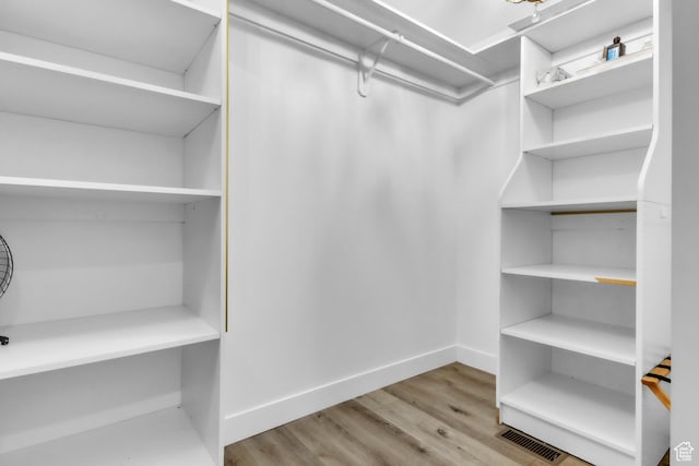 1960 N Lake Dr, Scofield, UT 84526 - walk in closet with wood finished floors