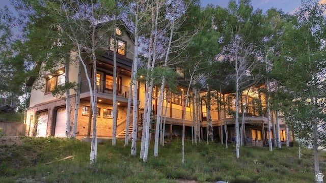 1960 N Lake Dr, Scofield, UT 84526 - back of property with a garage and a balcony