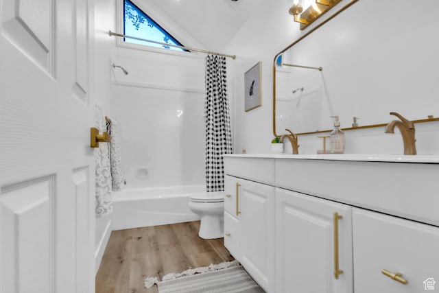 1960 N Lake Dr, Scofield, UT 84526 - bathroom featuring vanity, shower / bath combination with curtain, wood finished floors, and lofted ceiling