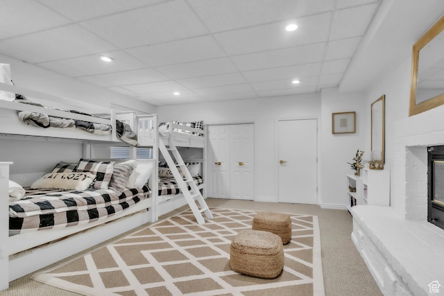 1960 N Lake Dr, Scofield, UT 84526 - bedroom featuring carpet floors, recessed lighting, and a brick fireplace