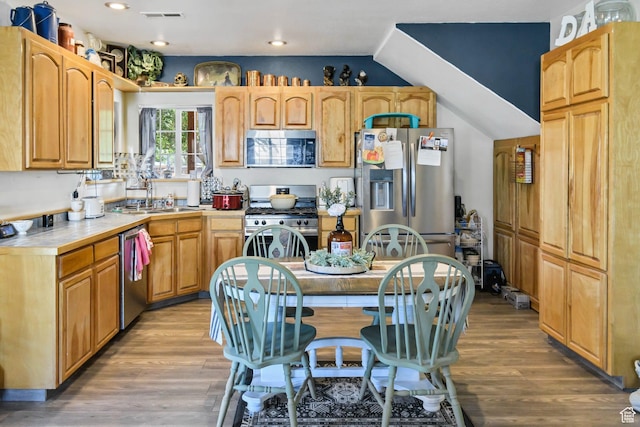 340 N Main St, Monroe, UT 84754 - kitchen featuring stainless steel appliances, wood finished floors, recessed lighting, and lofted ceiling