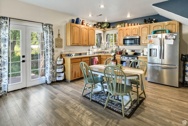 340 N Main St, Monroe, UT 84754 - kitchen featuring appliances with stainless steel finishes, french doors, wood finished floors, recessed lighting, and light countertops