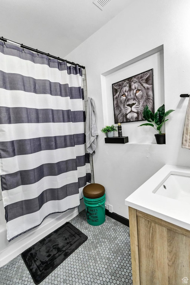 340 N Main St, Monroe, UT 84754 - bathroom with vanity and tile patterned floors