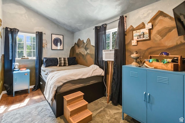340 N Main St, Monroe, UT 84754 - bedroom with vaulted ceiling, wood finished floors, and cooling unit