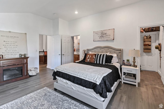 340 N Main St, Monroe, UT 84754 - bedroom featuring wood finished floors, lofted ceiling, connected bathroom, and recessed lighting
