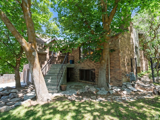 2586 S 1825 E, Ogden, UT 84401 - view of side of property with brick siding and stairs