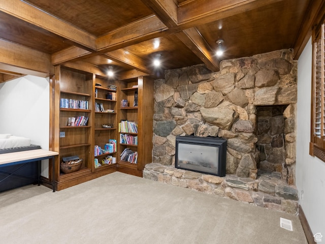 2586 S 1825 E, Ogden, UT 84401 - living area with a fireplace, carpet, and a wooden ceiling with exposed beams