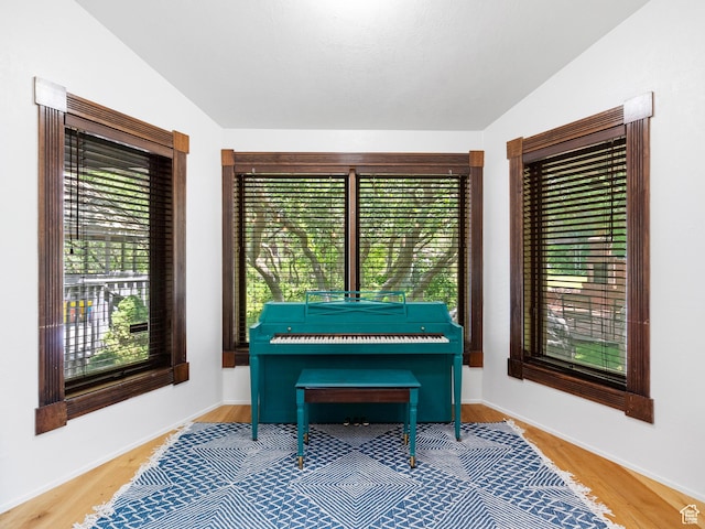 2586 S 1825 E, Ogden, UT 84401 - sitting room featuring vaulted ceiling, plenty of natural light, and wood finished floors
