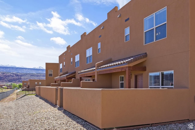 3853 Red Valley Cir Unit 22A1, Moab, UT 84532 - view of building exterior featuring a mountain view