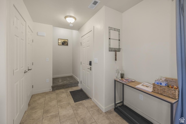 3853 Red Valley Cir Unit 22A1, Moab, UT 84532 - foyer entrance featuring baseboards and light tile patterned flooring