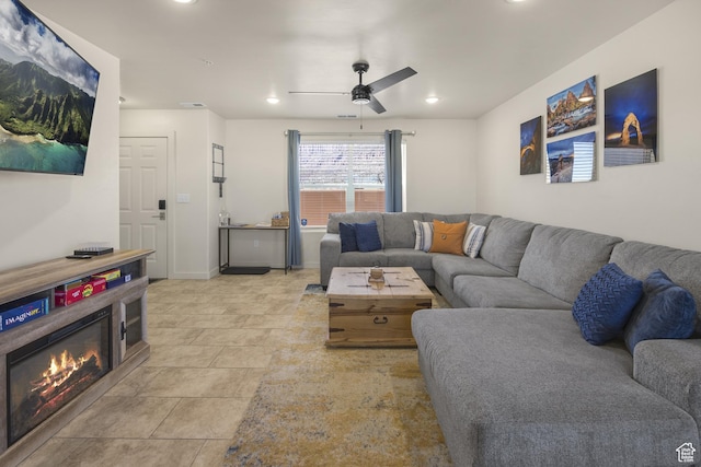 3853 Red Valley Cir Unit 22A1, Moab, UT 84532 - living area with a ceiling fan, recessed lighting, a glass covered fireplace, and light tile patterned floors