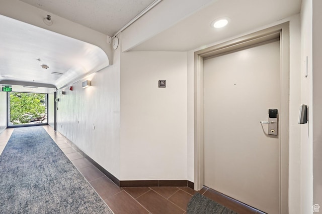 1485 Empire Ave Unit 513, Park City, UT 84060 - hallway featuring tile patterned flooring and baseboards