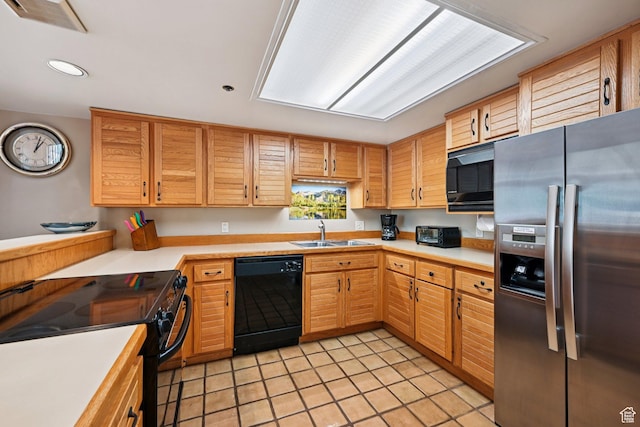 1485 Empire Ave Unit 513, Park City, UT 84060 - kitchen featuring black appliances, light countertops, light tile patterned floors, and recessed lighting