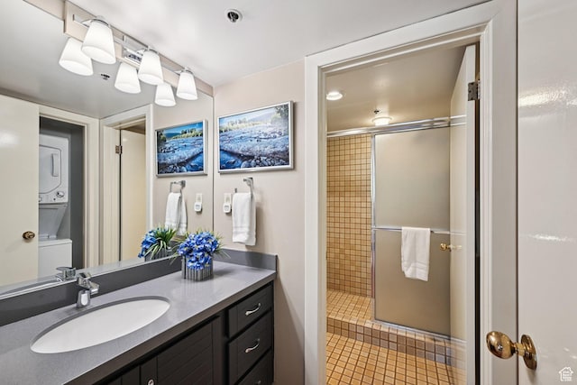 1485 Empire Ave Unit 513, Park City, UT 84060 - bathroom featuring vanity, a tile shower, and tile patterned floors