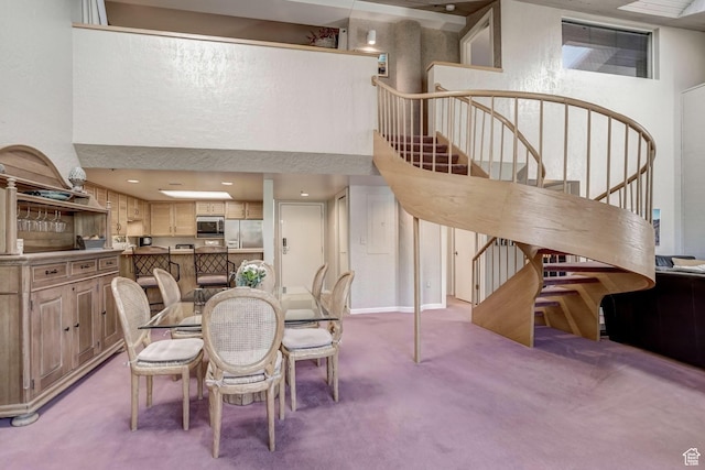 1485 Empire Ave Unit 513, Park City, UT 84060 - dining area with light carpet, stairs, and a towering ceiling