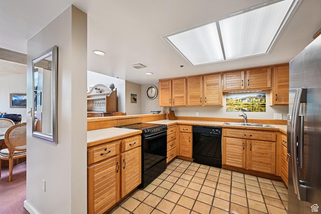 1485 Empire Ave Unit 513, Park City, UT 84060 - kitchen with black appliances, light countertops, light tile patterned floors, and recessed lighting