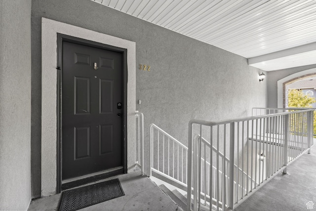 392 N Seven Peaks Blvd Unit 322, Provo, UT 84606 - view of exterior entry featuring stucco siding