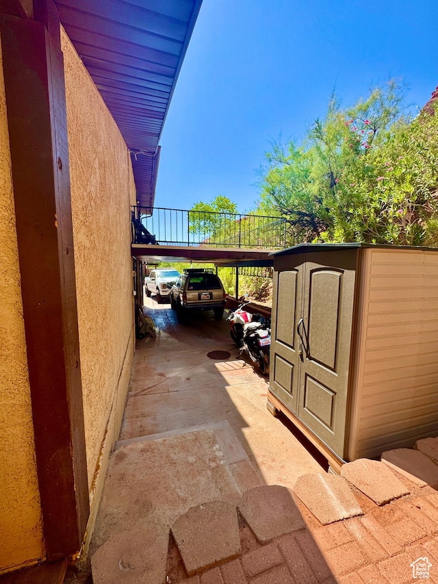695 N 500 W Unit 14, St George, UT 84770 - view of patio / terrace featuring a carport