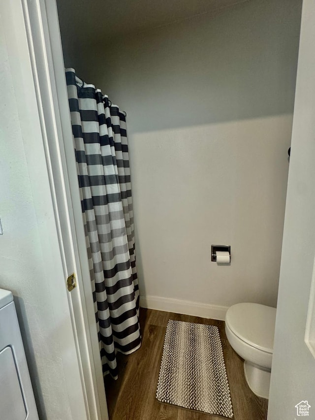 695 N 500 W Unit 14, St George, UT 84770 - bathroom with wood finished floors and a shower with curtain