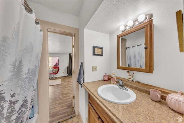373 N 400 W, Cedar City, UT 84721 - bathroom with vanity, a shower with shower curtain, and a textured ceiling