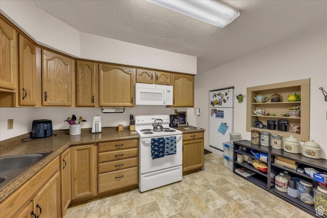 373 N 400 W, Cedar City, UT 84721 - kitchen with white appliances, dark countertops, stone finish flooring, brown cabinetry, and open shelves