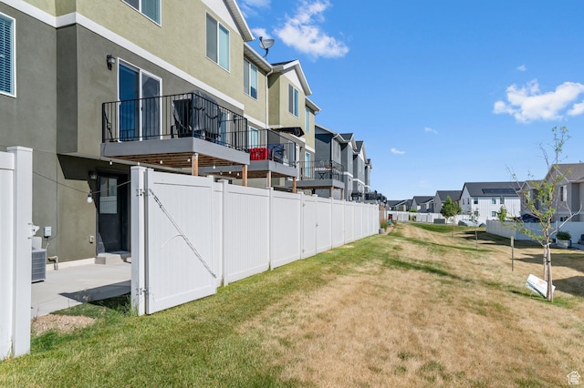 14907 S Messi St, Herriman, UT 84096 - view of yard featuring a residential view and a balcony