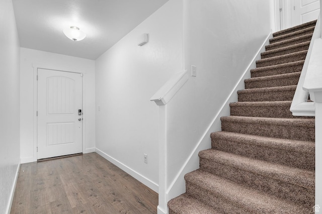 14907 S Messi St, Herriman, UT 84096 - foyer featuring wood finished floors and stairway