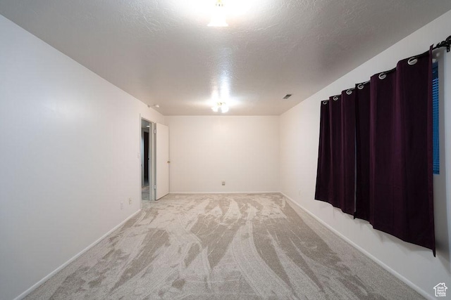 5465 W 5400 S, Kearns, UT 84118 - spare room with light carpet and a textured ceiling