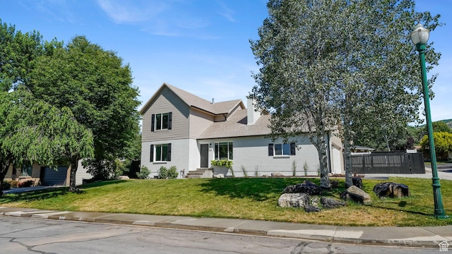 563 E 1840 N, Orem, UT 84097 - traditional-style home with a front yard and brick siding