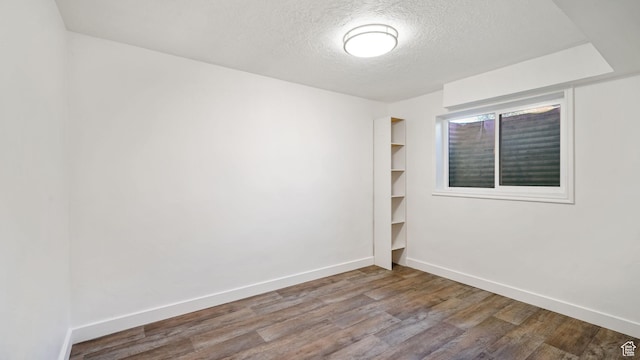 563 E 1840 N, Orem, UT 84097 - spare room with a textured ceiling and wood finished floors